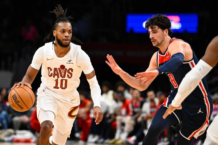 Feb 7, 2024; Washington, District of Columbia, USA; Cleveland Cavaliers guard Darius Garland (10) dribbles as Washington Wizards forward Deni Avdija (8) defends during the first half at Capital One Arena. Mandatory Credit: Brad Mills-USA TODAY Sports